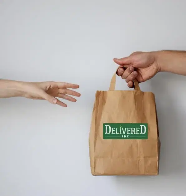 Hand receiving an order from Delivered