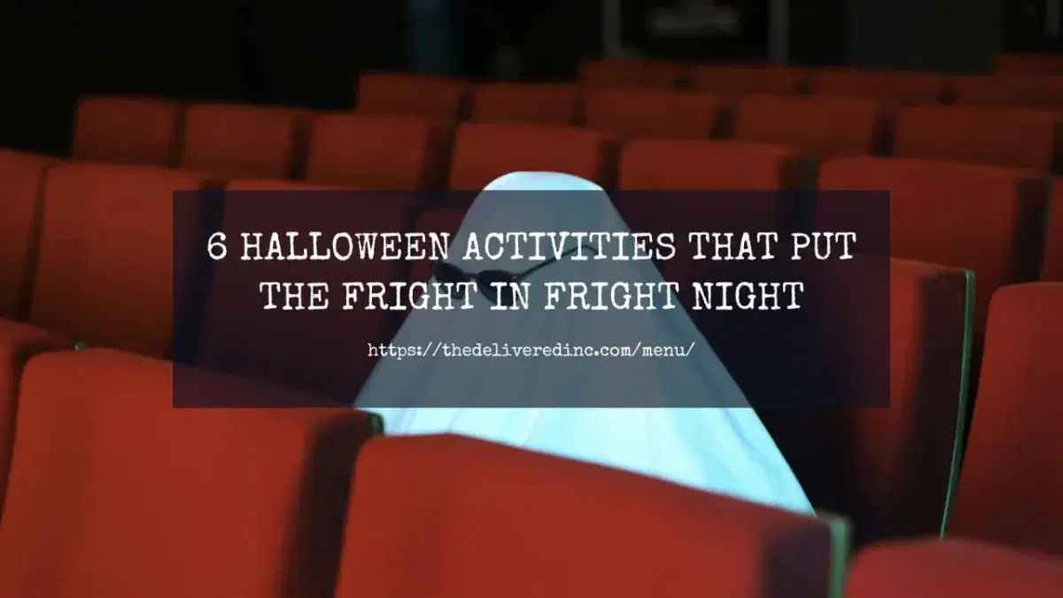an empty cinema with red seats