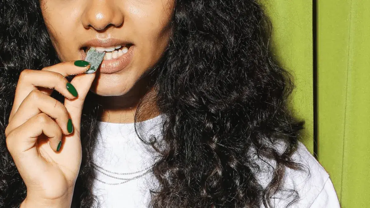 a person eating a cannabis gummy